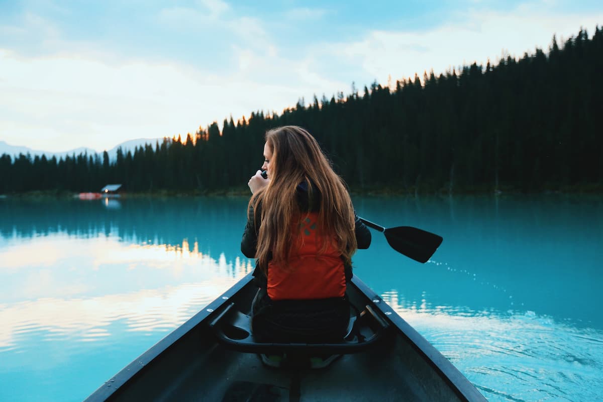 Woman rowing a boat